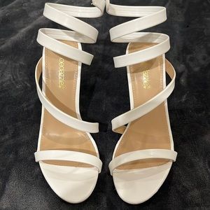 White heeled sandals